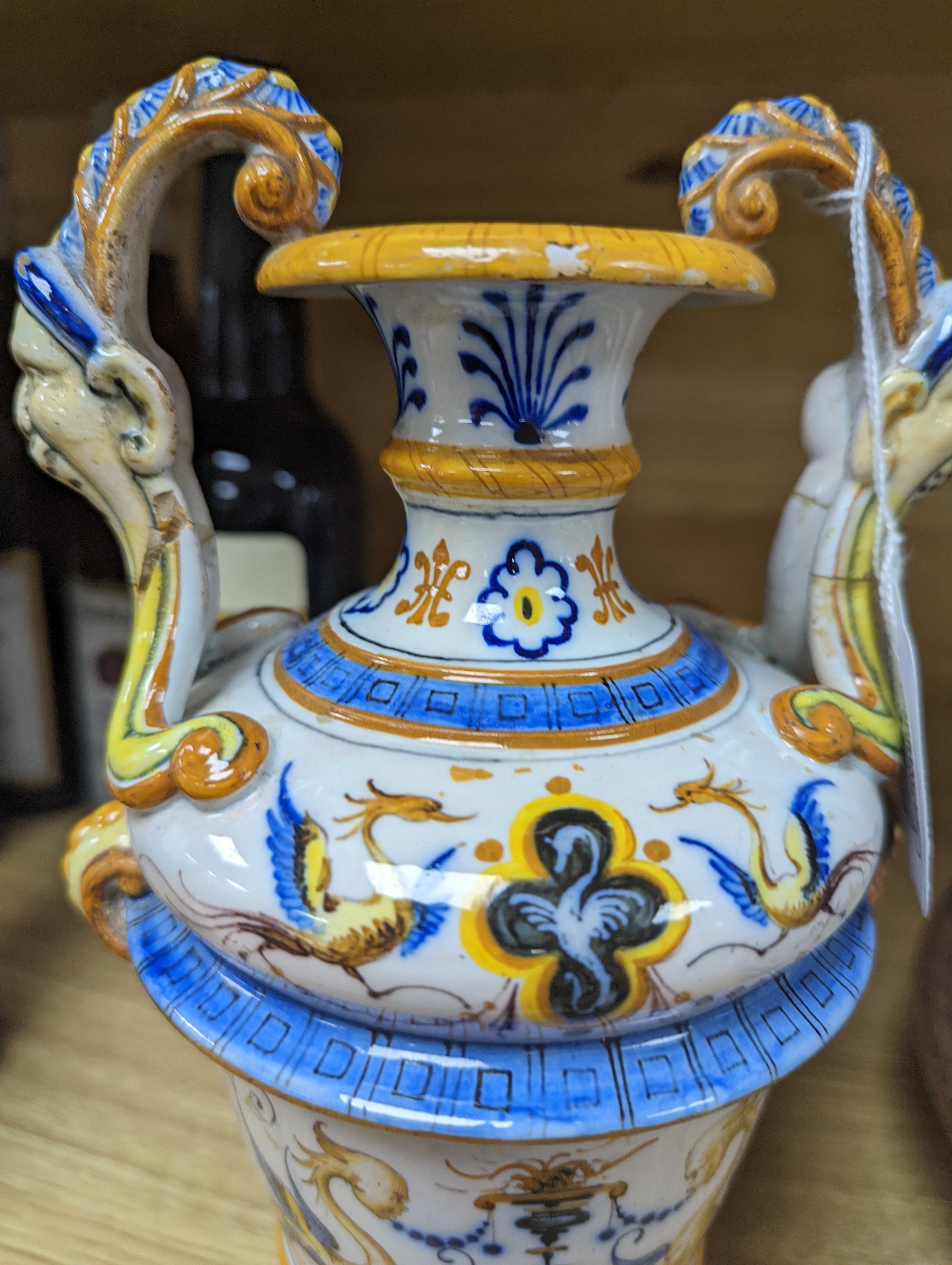 A Ginori maiolica two handled vase and Delft polychrome double cylinder teapot 27cm